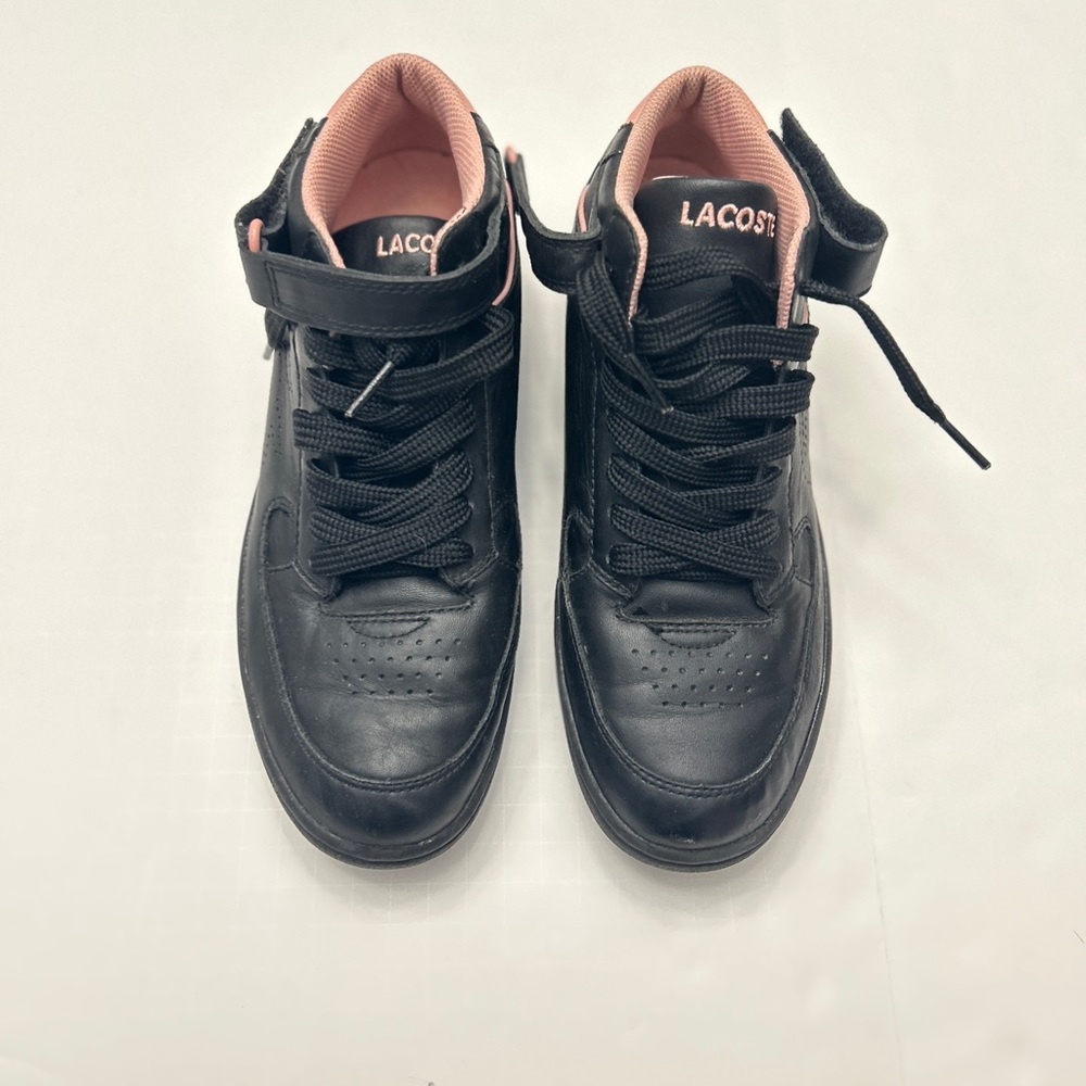 Woman 8.5 black Lacoste sneaker.